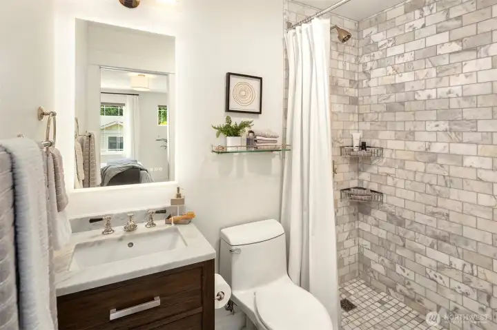 Bathroom off of fourth bedroom. Bathroom off of fourth bedroom.
