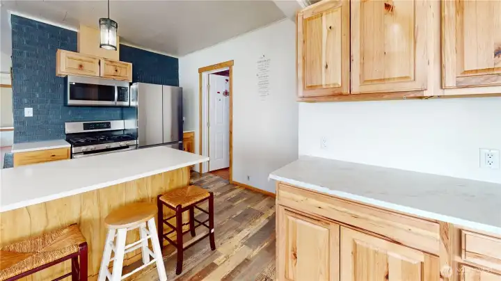 Plenty of storage in the kitchen, with nice wood cabinetry and lots of natural light. Plenty of storage in the kitchen, with nice wood cabinetry and lots of natural light.