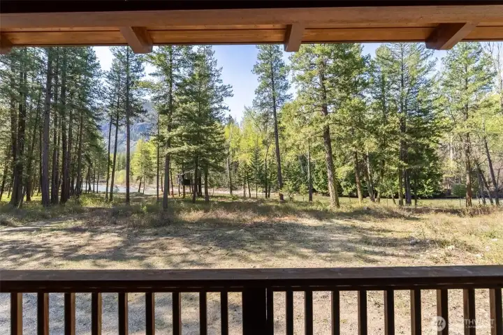 Spacious covered deck overlooking the river—perfect for relaxing after a day of Methow Valley adventure. Spacious covered deck overlooking the river—perfect for relaxing after a day of Methow Valley adventure.