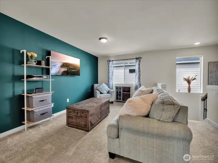 Cozy loft living area upstairs.