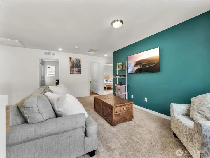 Informal living area/TV room/playroom.