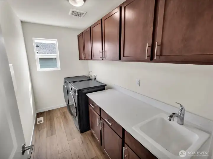 Dedicated laundry room conveniently located upstairs.