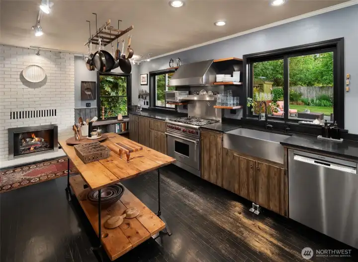 Rustic warmth meets culinary function in this inviting kitchen, where every detail has been thoughtfully crafted for cooking, entertaining, and everyday living.