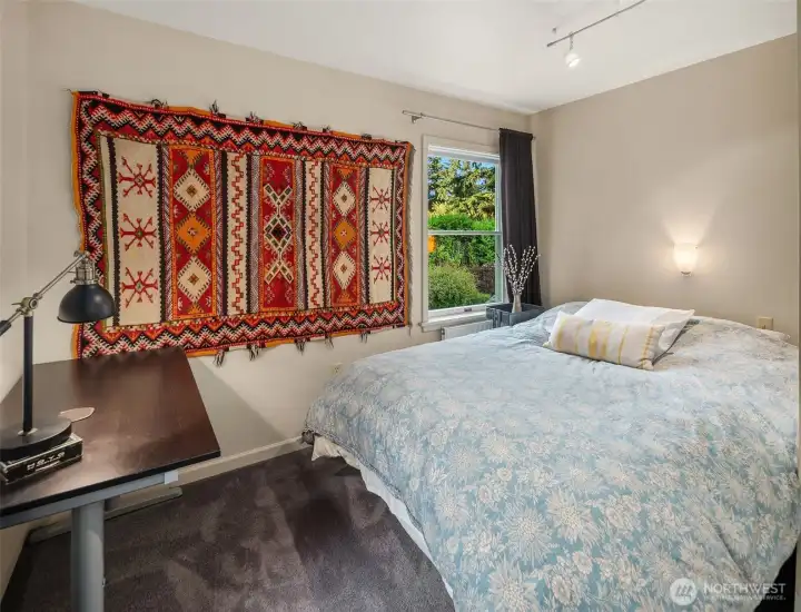 Tucked among the treetops, this inviting bedroom offers a quiet retreat at day's end.