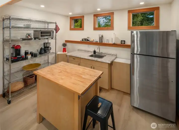 A functional kitchenette supports comfortable guest accommodations or flexible living arrangements.