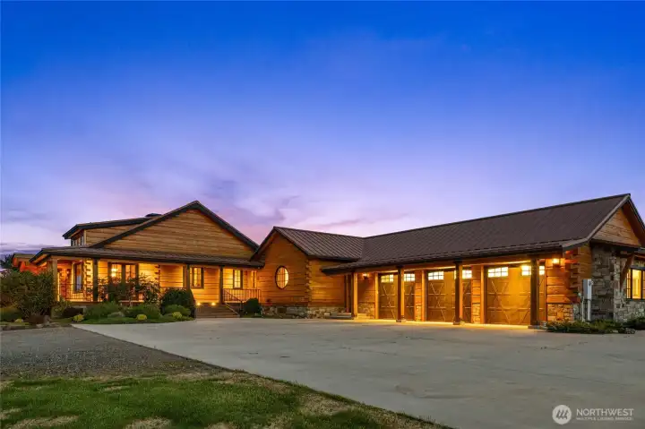 Attached 3 car garage w/ 1 pass through bay