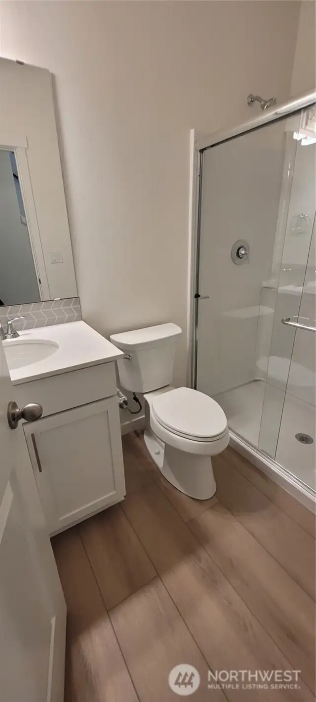 Main floor bathroom with shower