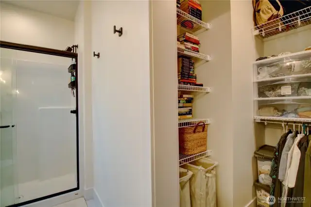 Primary walk-in shower and walk-in closet