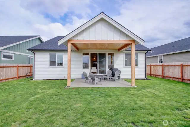 Sitting on .14 Acre lot with fully fenced back yard and covered back patio