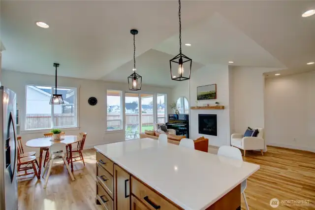 Stunning laminate hardwood floors and quartz counters