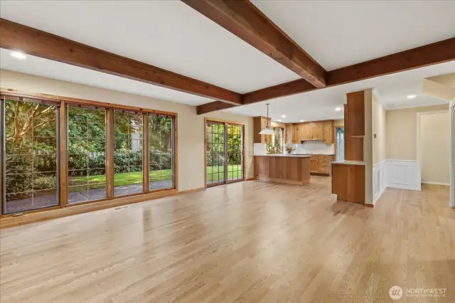Family room is light and bright with picture window views of the backyard.
