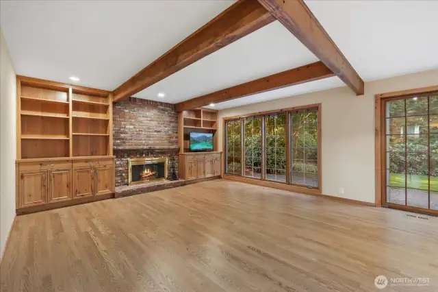 Beautiful large family room with new hardwood floors. Seller had the floor raised to remove the step down so it would be all one level.