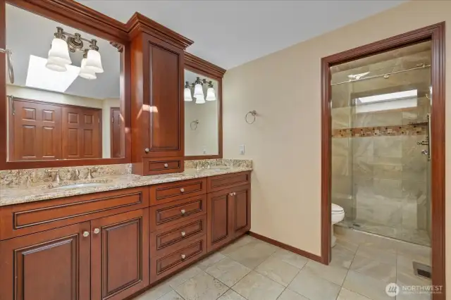 This stunning ensuite features a double vanity with tons of storage and step-in shower.