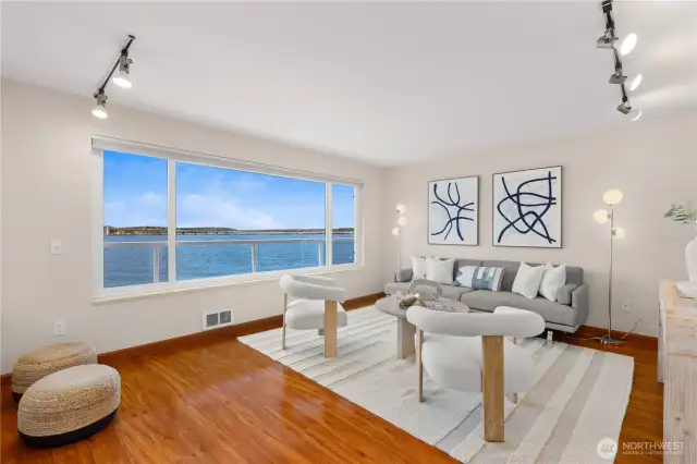 Feel like you're floating over the lake in this 2 bedroom, 2 bathroom condo in the heart of Madison Park.