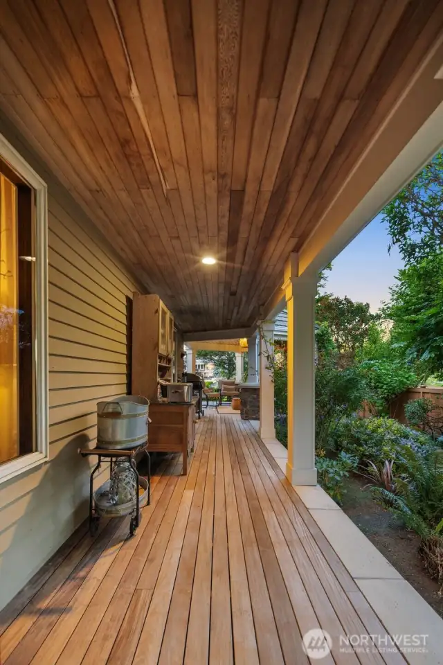 Wrap around porch with Brazilian walnut/ironwood. Cobblestone path leads from front flower filled gardens to Lake Tapps treasured shoreline.