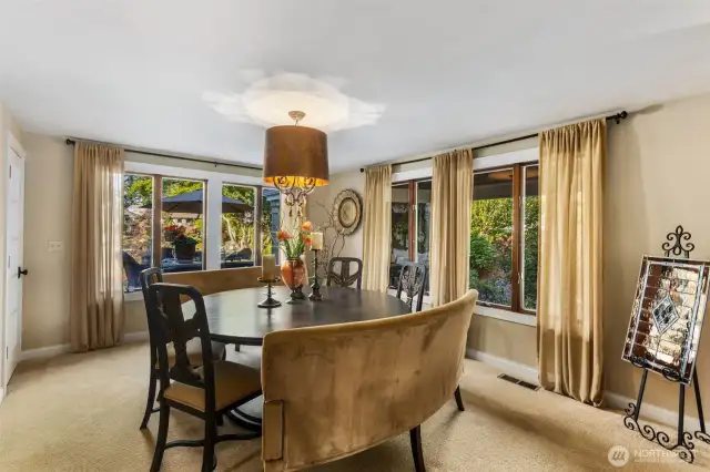 Formal living & dining spaces w/large windows to capture the natural light & beauty of the outdoors.