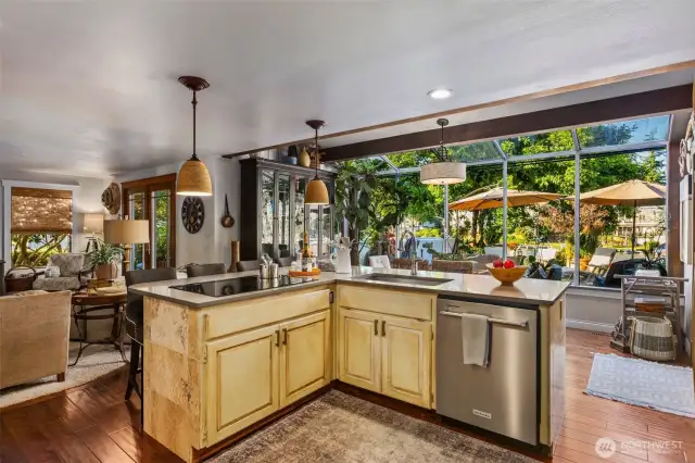 Floor to ceiling windows frame the manicured gardens & waterfront for peaceful tranquility.