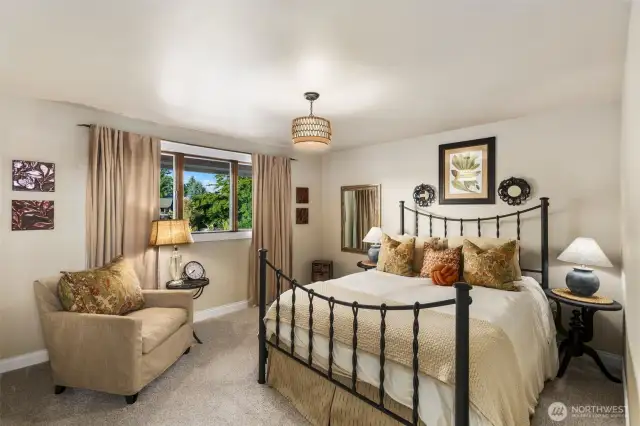 Large third bedroom w/ lake & garden views.