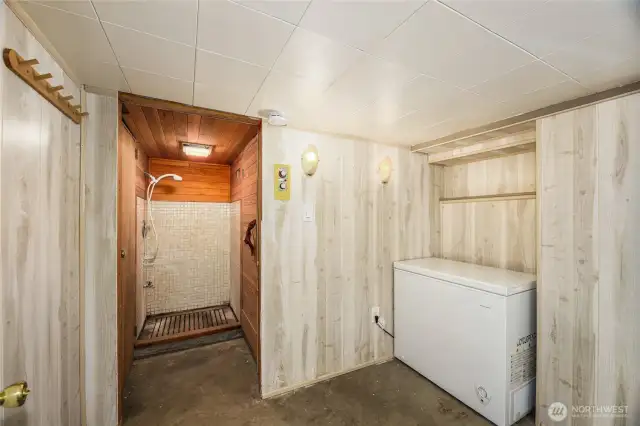 There is a shower in the basement that might be good for a dog wash station or remodel for an additional shower.