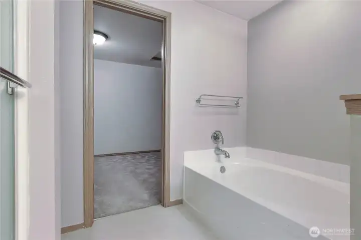 Primary Bathroom w/ a Tub & Walk-In Closet