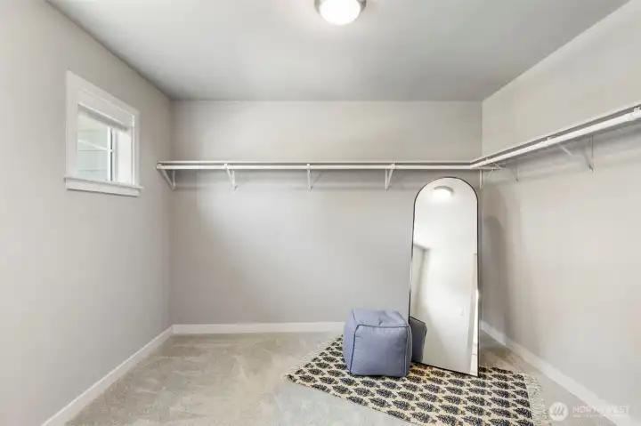 Large primary walk-in closet.
