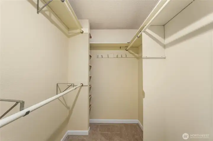 Walk in closet with lots of hanging space