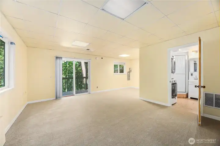 LARGE room with slider, leading to rear yard and deck.