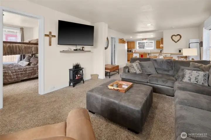 Fairly new carpet through out living room and bedrooms.