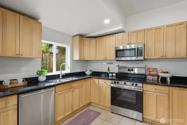 Wash dishes while looking into garden