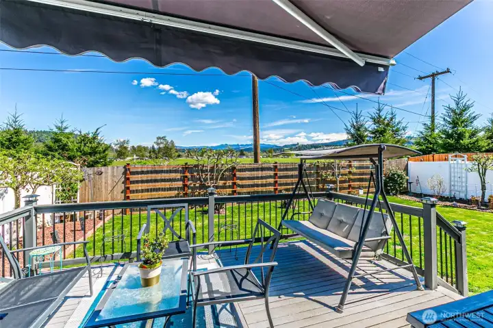 The backyard looking southeast, Mt Rainier is behind those clouds