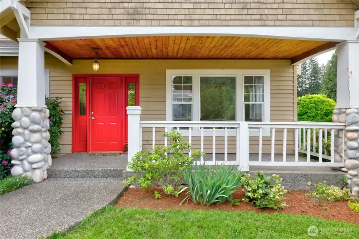 The red door brings a bright & welcoming smile!