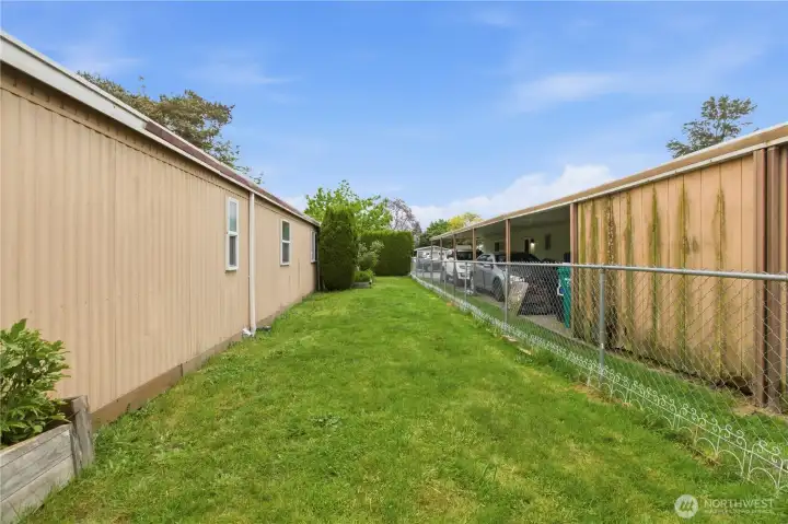 Lots of yard, fenced in for pets or little ones ~