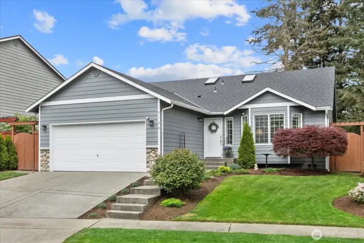 Charming single-level living w/ attractive architectural details, skylights, & a fully fenced setting.