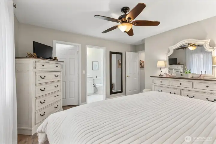 Thoughtfully designed owner’s retreat featuring an ensuite bath & generous walk-in closet.