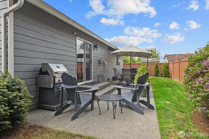 Multiple outdoor seating areas provide flexibility for entertaining guests or quiet evenings at home.