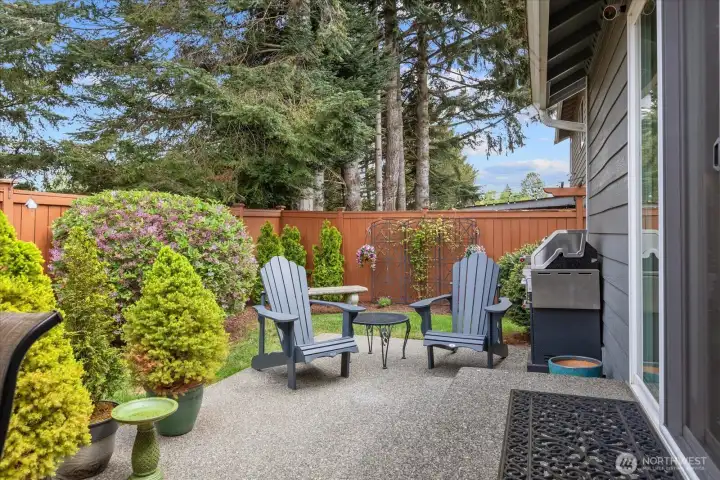 Thoughtfully landscaped & fully fenced backyard creates a comfortable and private outdoor retreat.