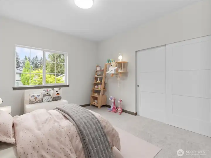 Lovely upper-level bedroom featuring great natural light, ample closet space, and the added comfort of a private ensuite 3/4 bath connection.
