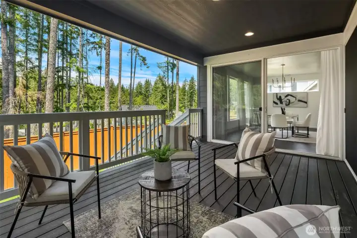 Private fenced yard backs to a mature greenbelt, offering a peaceful natural backdrop and rare privacy.