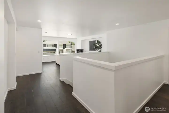The upper level feels unusually open and spacious, with wide hallways and a generous leisure room that create a true second living area rather than just a pass-through space. Ideal for movie nights, gaming, homework, or a relaxed lounge, this flexible area adds everyday functionality and a strong sense of separation from the main-level living spaces.