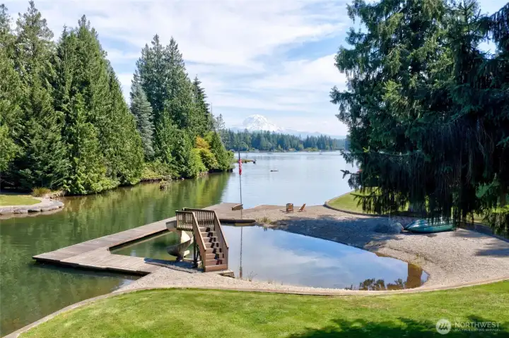 Once is a generation waterfront estate where luxury, privacy and breathtaking natural beauty converge. Mt Rainier and open water views plus protected swimming area Once is a generation waterfront estate where luxury, privacy and breathtaking natural beauty converge. Mt Rainier and open water views plus protected swimming area