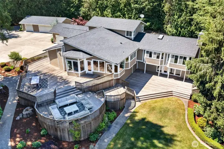 Stunning estate featuring multilevel hardwood deck to enjoy the view Stunning estate featuring multilevel hardwood deck to enjoy the view