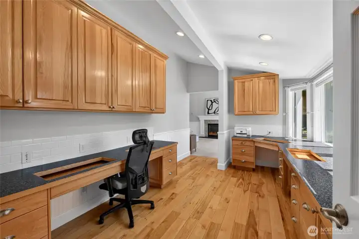 This main floor primary suite features a bonus area perfect for private office, craft space or nursery This main floor primary suite features a bonus area perfect for private office, craft space or nursery
