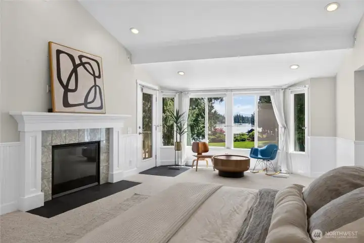 Vaulted ceilings and seating area complete this spacious primary suite Vaulted ceilings and seating area complete this spacious primary suite