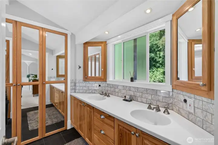 Dual vanities, dual closets, jetted tub and separate shower in the primary suite Dual vanities, dual closets, jetted tub and separate shower in the primary suite