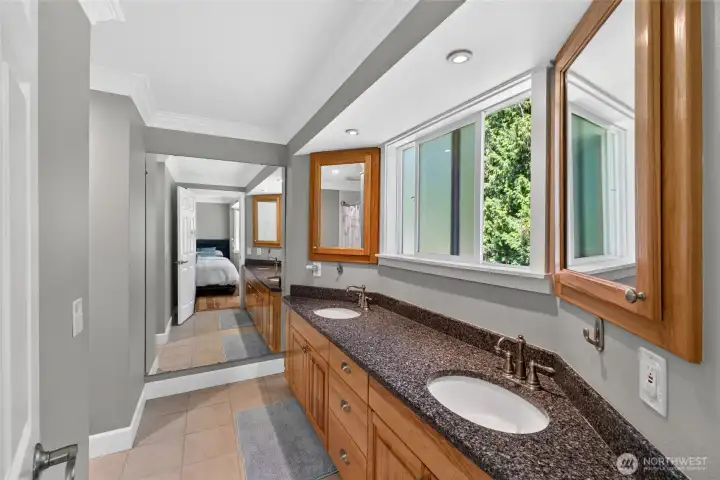 The ensuite bath in the 2nd primarty offers dual vanities and tub/shower combination The ensuite bath in the 2nd primarty offers dual vanities and tub/shower combination