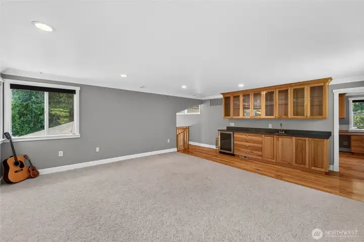 Bonus room/media room with built ins and wetbar Bonus room/media room with built ins and wetbar