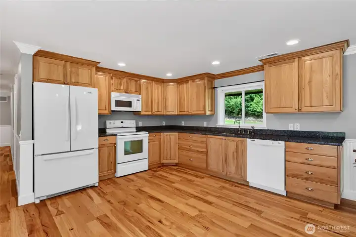 The lower level is perfectly suited for multigeneration living with its own kitchen, rec room, bedroom and bath The lower level is perfectly suited for multigeneration living with its own kitchen, rec room, bedroom and bath