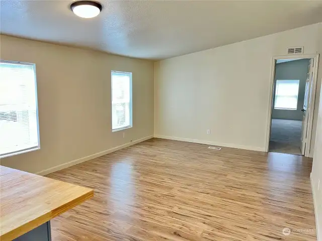 2nd living area off the kitchen with 3 bedrooms and 2 baths off it