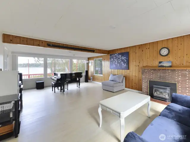 Walk through great room to sunporch and deck