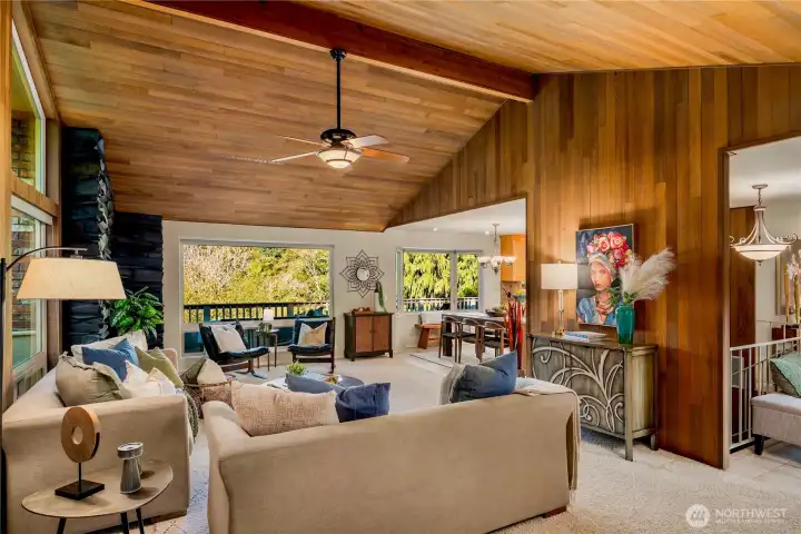 Open-concept living flows effortlessly into the dining and kitchen areas, ideal for gatherings large or small.